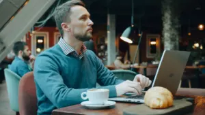 Reader browsing technology articles on a laptop